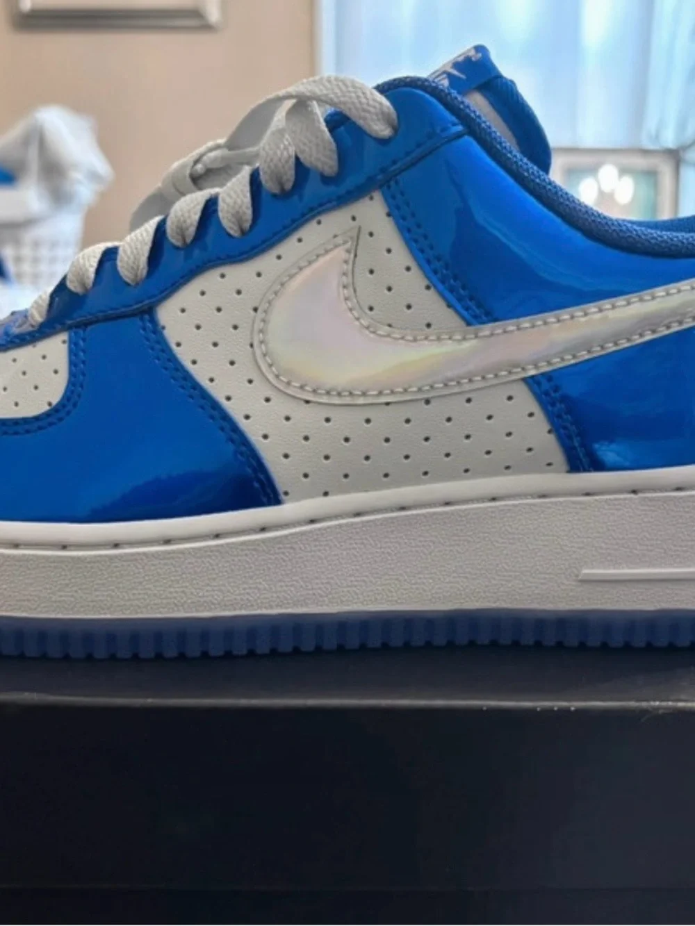 Nike Low-Top Sneakers in Bright Blue and White with Iridescent Swoosh